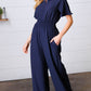 Dark Blue Smocked Waist Notch Neck Crepe Jumpsuit