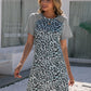 Ivy Lane Leopard Round Neck Short Sleeve Mini Dress