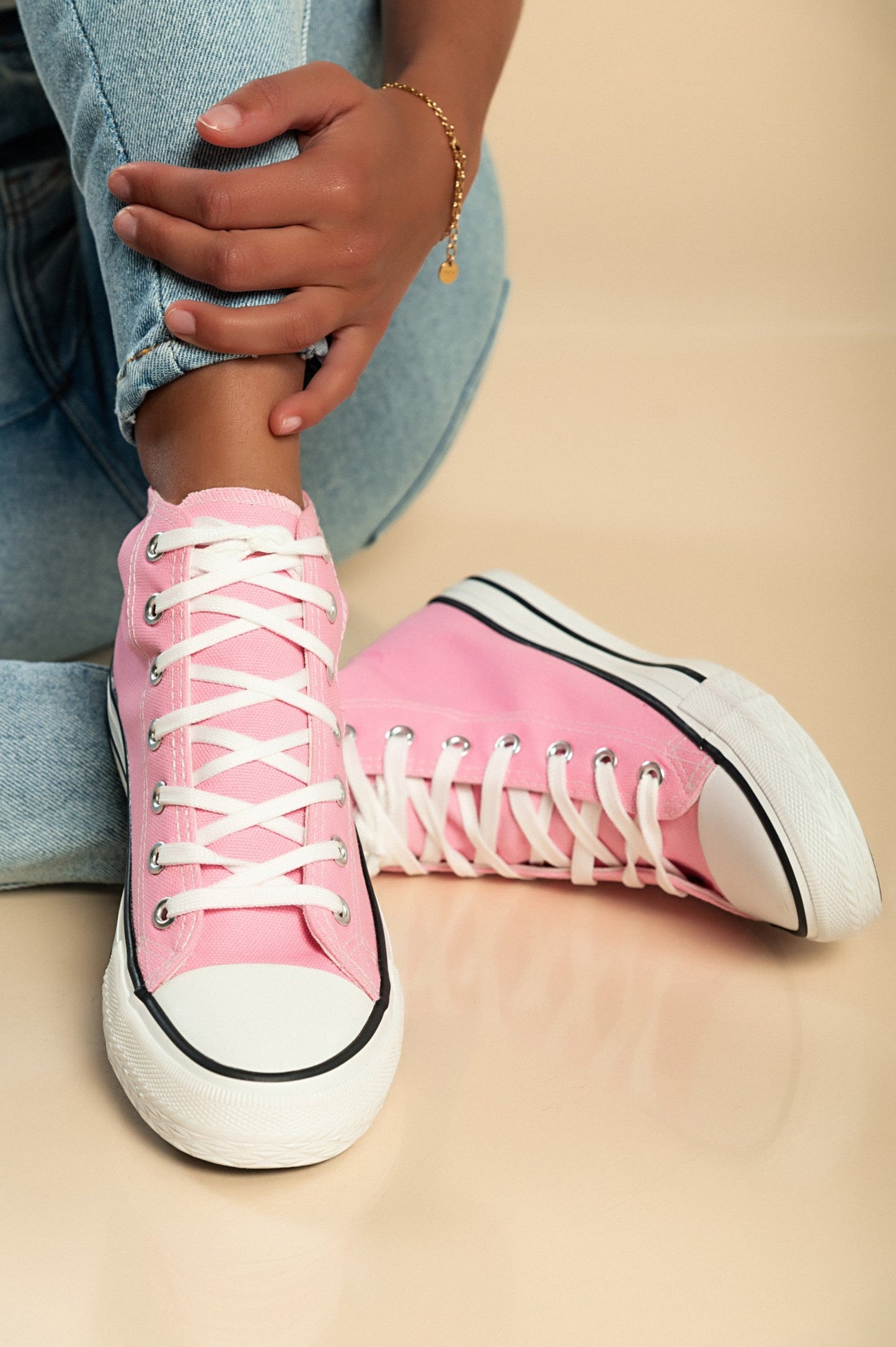 Fashionable High-Top Sneakers Made of Pink Fabric