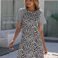 Ivy Lane Leopard Round Neck Short Sleeve Mini Dress