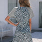Ivy Lane Leopard Round Neck Short Sleeve Mini Dress