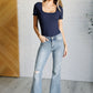 Caroline Mid Rise Control Top Distressed Flare Jeans